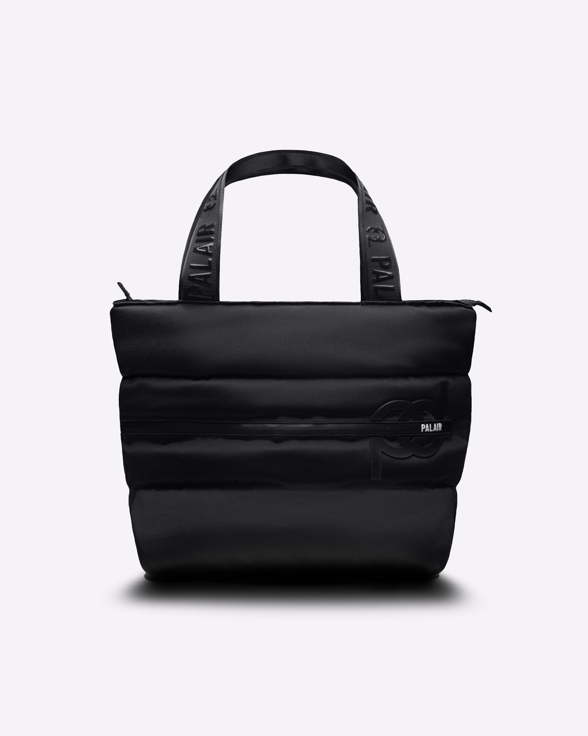 Our chic luxe quilted Palairsport Power tote is an innovative first featuring a Unique Padel pocket with powerful snapback closure. Designed to keep you on the go and carry all essentials with ease.